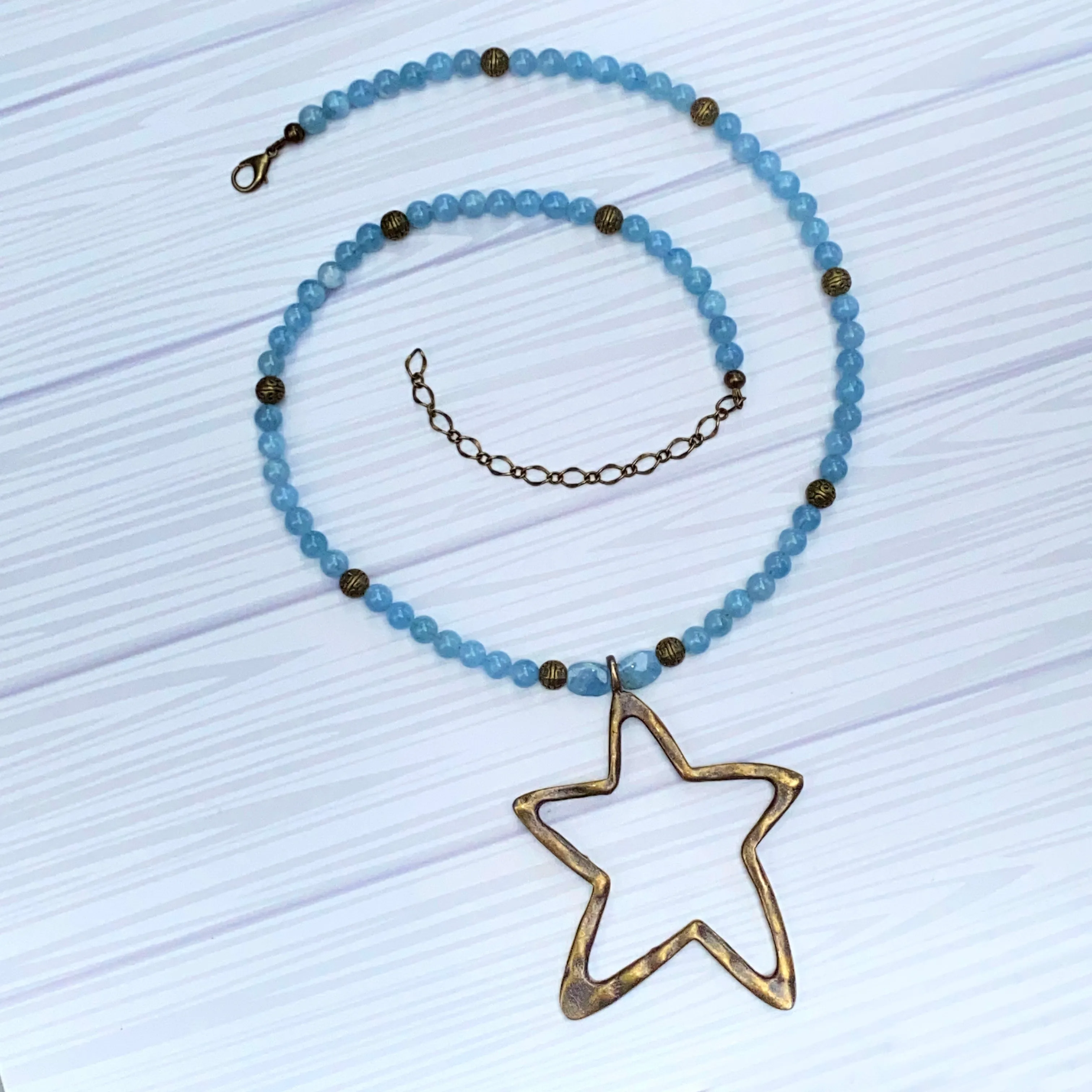 Aquamarine and Brass Star pendant Necklace