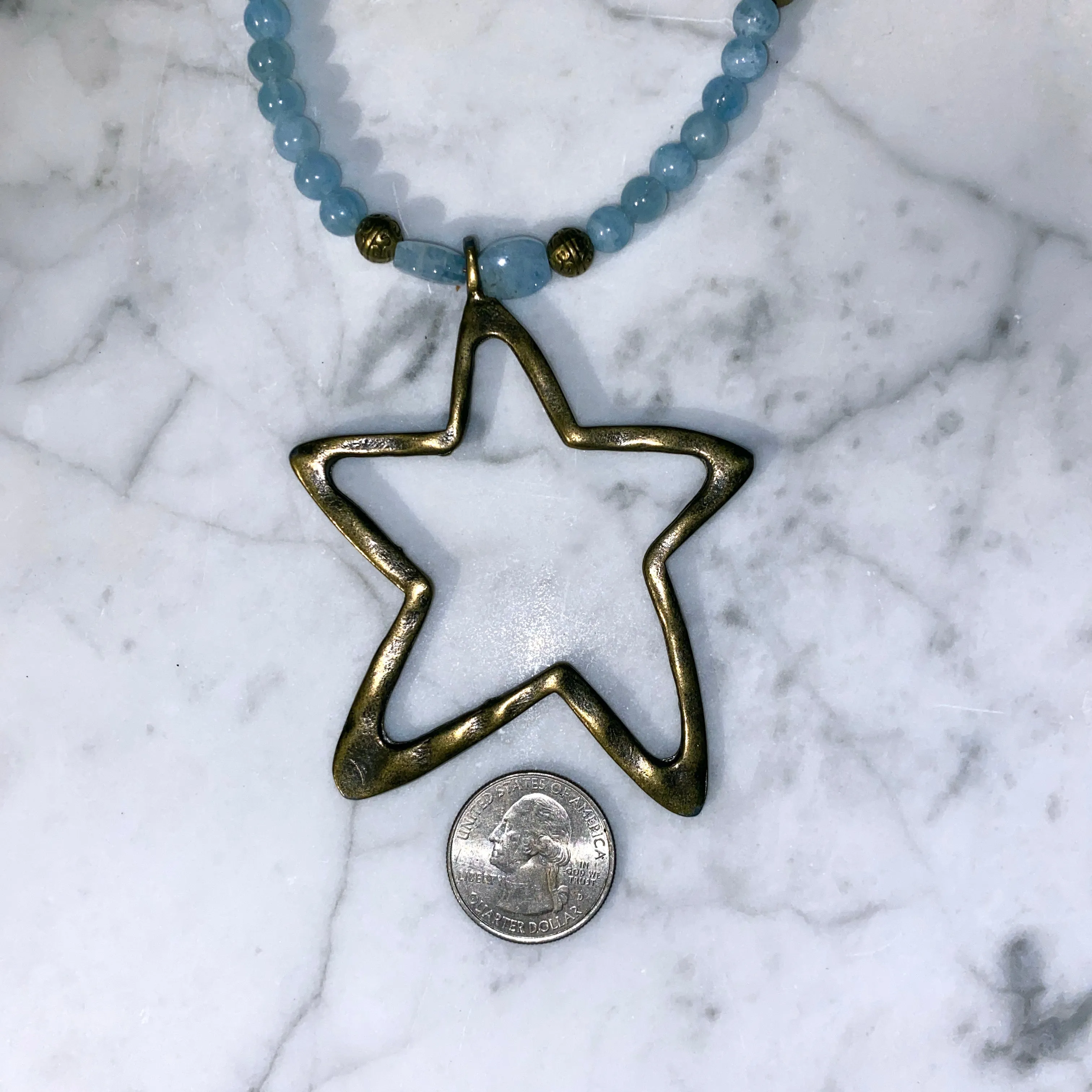 Aquamarine and Brass Star pendant Necklace