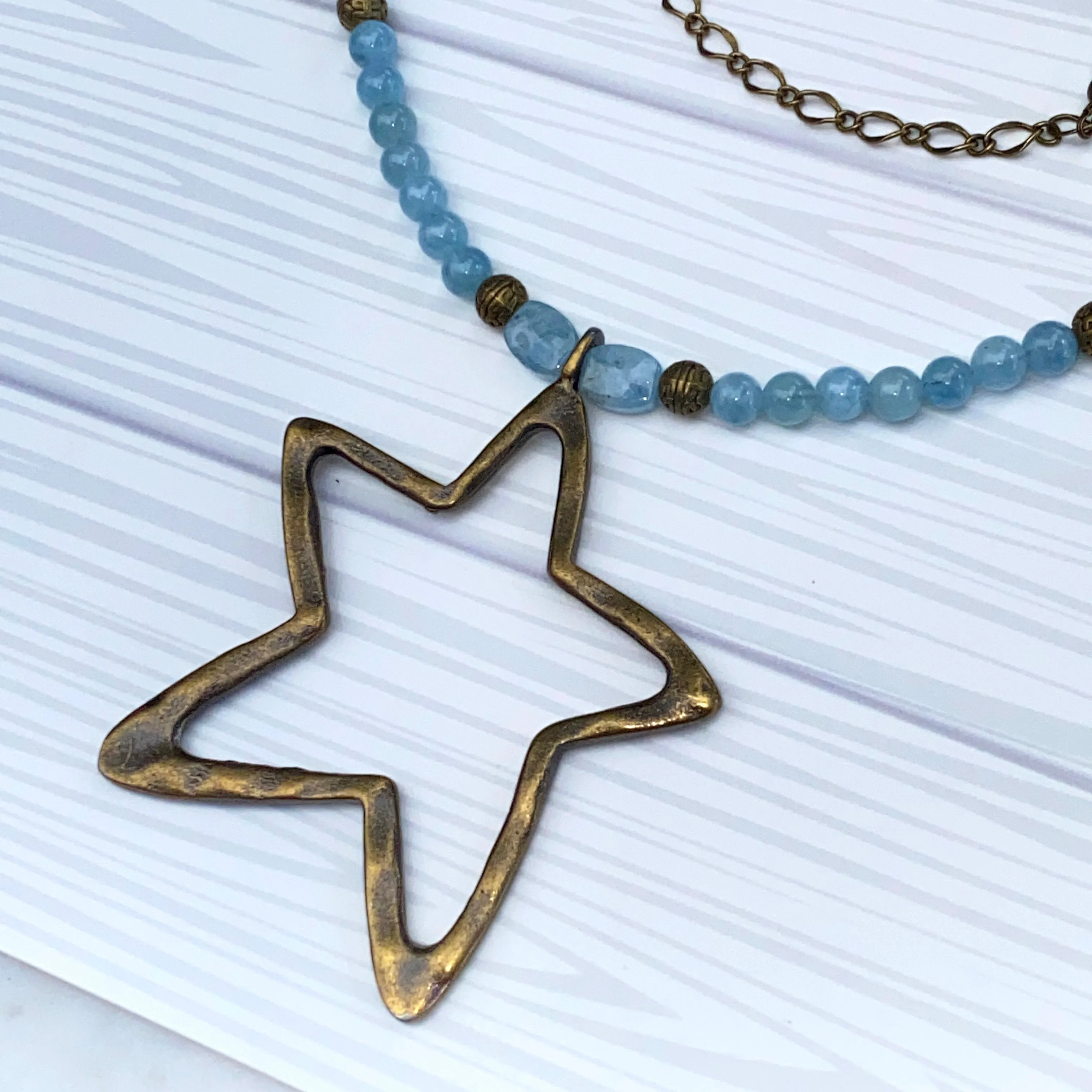 Aquamarine and Brass Star pendant Necklace