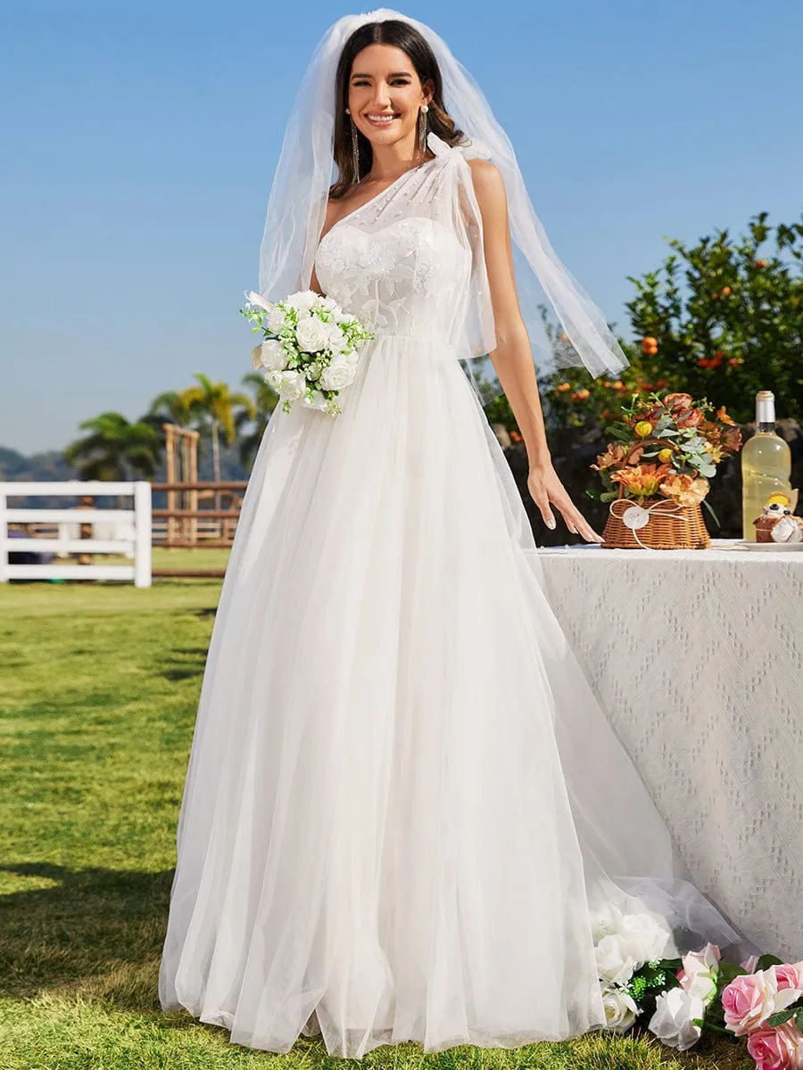 Asymmetric Printed Sleeveless Wedding Gown with Bow Detail