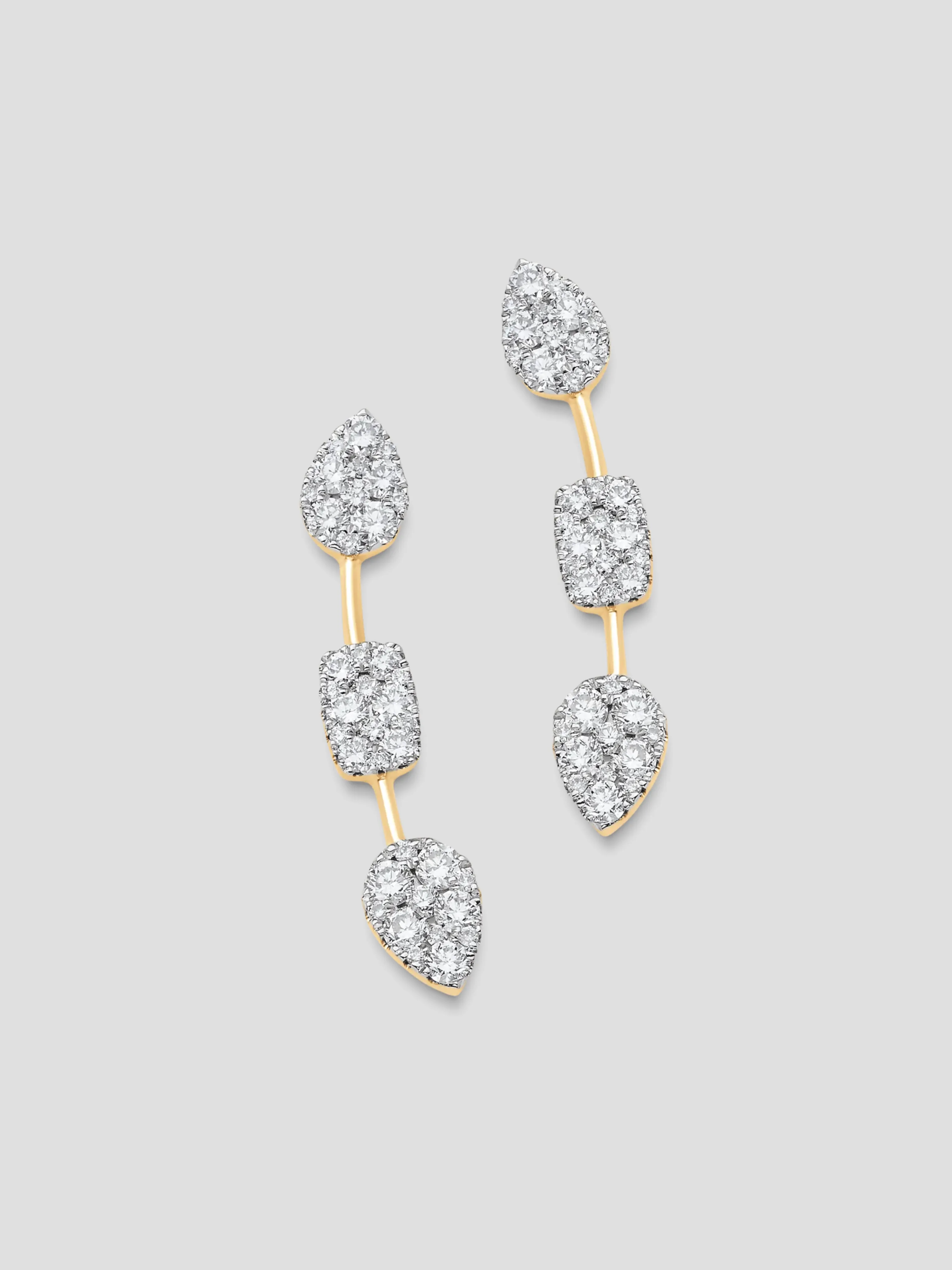 Yellow Gold White Diamond Reverie Ear Crawler with 2 Pear and 1 Cushion Clusters. **Left**